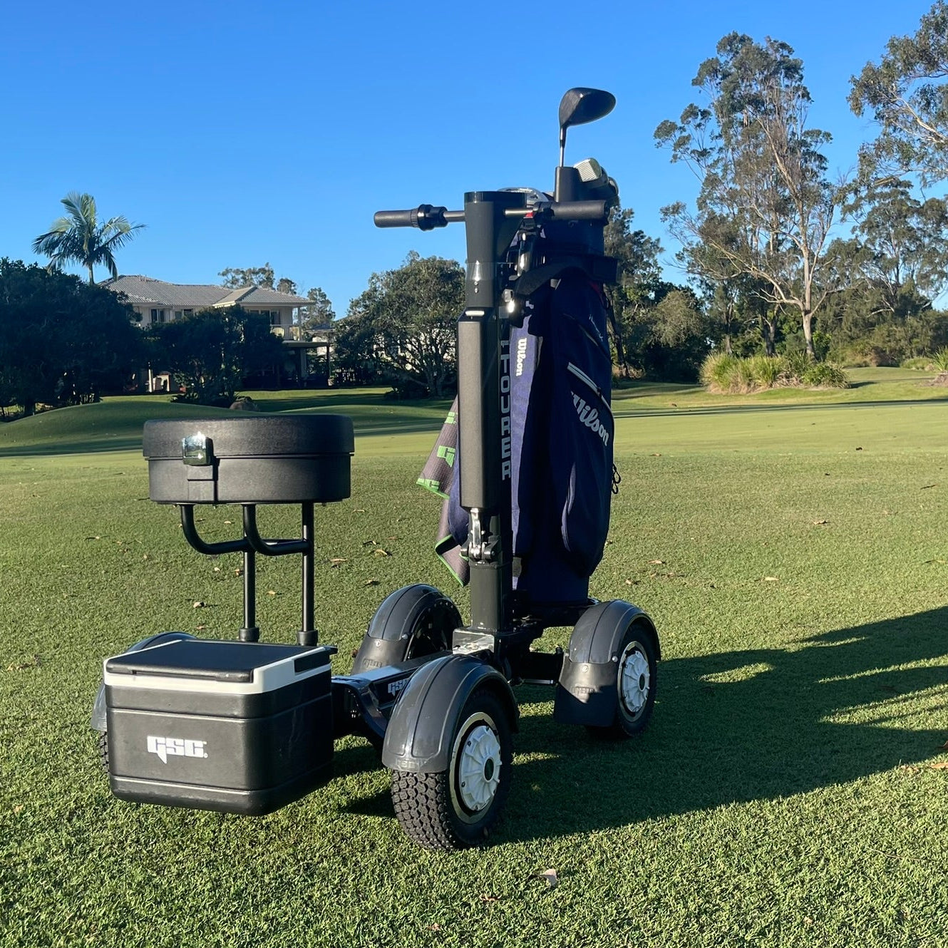 the GSC Tourer X Golf trolley with cooler on a golf course